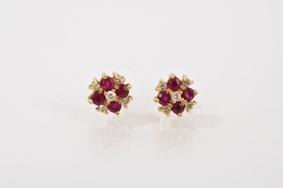 Lot 220 - Pair of 18ct gold ruby and diamond cluster earrings