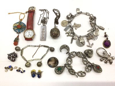 Lot 223 - Silver gilt filigree and seed pearl pomander, silver charm bracelet with quantity of charms, two white metal bracelets, silver ingot pendant etc