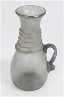 Lot 242 - Ancient, possibly Roman, glass vessel with...