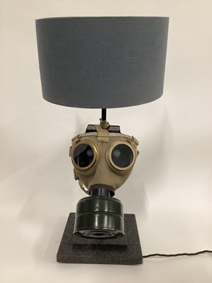 Lot 43 - Old Gas Mask lamp with blue shade, 61cm with shade, 52cm without shade, on 23cm square base