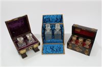 Lot 1030 - Three 19th century cased perfume bottle sets...