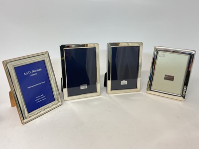 Lot 79 - Four silver photo frames, including two to hold 5" x 3 1/2" photos, and two to hold approx 5 3/4" x 3 3/4" (probably meant for 6" x 4" photos), in original boxes