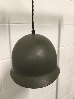 Lot 74 - Helmet hanging light, 17cm x 22cm x 26cm, with circular ceiling fitting (Helmet possibly an American pattern, but German inscription to inside)