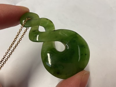 Lot 213 - Nephrite jade carved pendant on a 9ct gold chain