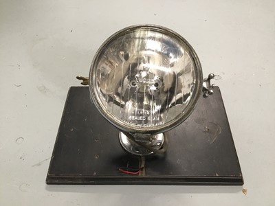 Lot 108 - Mounted Headlight lamp, 24cm high, on 21cm x 33cm mount