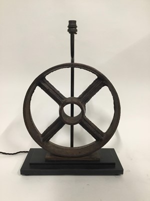 Lot 126 - Industrial Wheel lamp, 51cm high to top of light fitting, 34cm diameter wheel, on 35cm x 15cm base