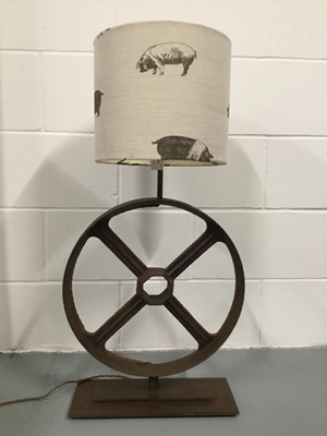 Lot 134 - Industrial Wheel lamp with Emily Bond Pig drum shade, 87cm high with shade, wheel diameter 43cm, on 15cm x 40cm base