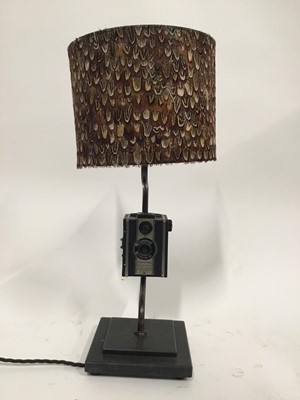 Lot 145 - Vintage Camera (Coronet) lamp with shade, 55cm high with shade, on 18cm square base