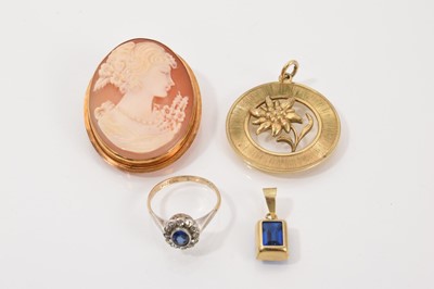 Lot 267 - 18ct gold mounted carved shell cameo brooch, yellow metal floral disc pendant, blue stone pendant and a 9ct gold cluster ring in silver setting