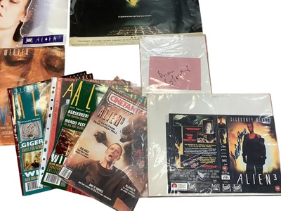 Lot 1475 - Film Memorabilia Aliens items include HR Giger signed VHS video, an album of coloured photographs, signed photographs and pieces, Alien publications, small posters etc.