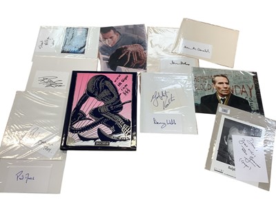 Lot 1475 - Film Memorabilia Aliens items include HR Giger signed VHS video, an album of coloured photographs, signed photographs and pieces, Alien publications, small posters etc.