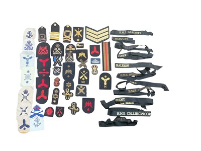 Lot 769 - Group of various Royal Navy Cap Tallies, cloth badges, bullion badges and others (1 box).