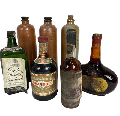 Lot 156 - Seven bottles, including Gordon's gin, 1950s-60s, Drambuie, Apricot Brandy and three bottles of Dutch Bols in stoneware bottles