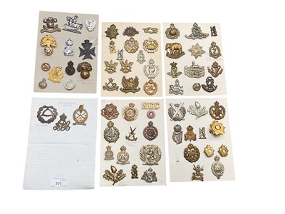 Lot 771 - Group of six boards mounted with a selection of British Military cap badges to include Scottish Horse, Royal Artillery Volunteers and Royal Armoured Corps.