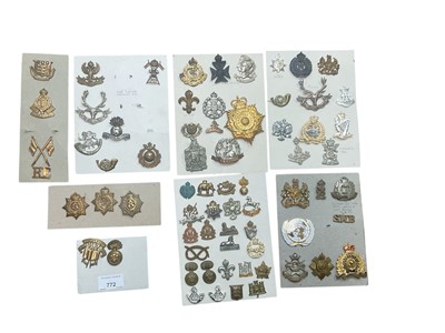 Lot 772 - Group of eight boards mounted with a selection of British Military cap badges to include Artists Rifles, Army Ordnance Corps and Norfolk Regiment.