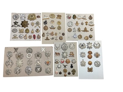 Lot 783 - Group of six boards mounted with a selection of British Military cap badges to include Scottish Horse, Cameron Highlanders and RAF.