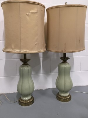 Lot 156 - Two Large Porcelain table lamps in green with fixed silk shades, 107cm high, base width 20cm