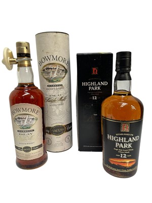 Lot 169 - Two bottles, Bowmore Darkest Islay Single Malt Whisky, 70cl., 43% and a bottle of Highland Park 12 year old whisky, 70cl., 40%, both in original boxes