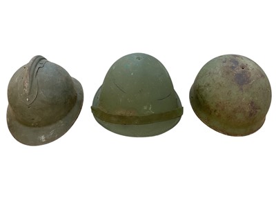 Lot 793 - Second World War British Paratroopers / Despatch Riders helmet shell, French steel helmet, British MK III pattern steel helmet and group of berets and cloth caps.