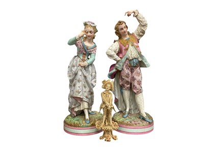 Lot 217 - Large pair of Continental figurines and a smaller figure