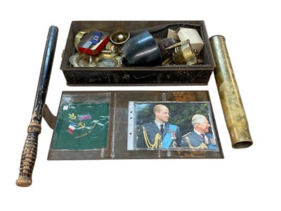 Lot 794 - Collection of mixed militaria to include bullet casings, a truncheon, mess tins, and trench art items (1 box).