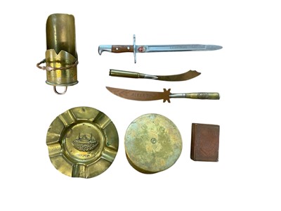 Lot 795 - Group of Trench Art items to include a match box cover, coal scuttle, officers cap and ashtray (7 items).