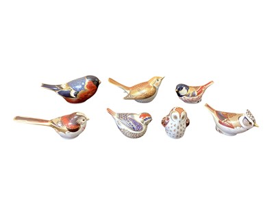 Lot 1280 - Seven Royal Crown Derby bird paperweights including Bullfinch and Long Tailed Tit