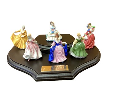 Lot 1282 - Set of six Royal Doulton miniature figures - Day Dreams, Kirsty, Nicola, Sara, Fair Lady and Autumn Breeze, on stand