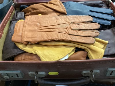 Lot 660 - Vintage gloves and cotton reels in two brown suitcases