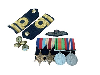 Lot 932 - Second World War medal group comprising 1939 - 1945 Star, Africa Star, Defence and War medals (mounted on bar), together with Royal Navy buttons and badges.