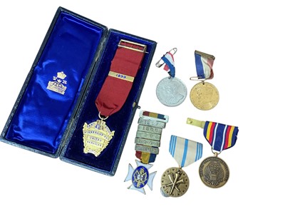 Lot 933 - Victorian silver gilt Army eight winners medal in case 1899, hallmarked Birmingham 1899 and a small group of other medals.