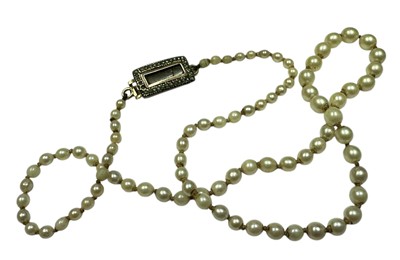 Lot 233 - Cultured pearl necklace with a single strand of graduating pearls and a Georgian yellow metal seed pearl clasp, 45cm long