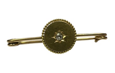 Lot 238 - Edwardian 15ct gold bar brooch with applied circular panel containing a central old cut diamond, 53mm