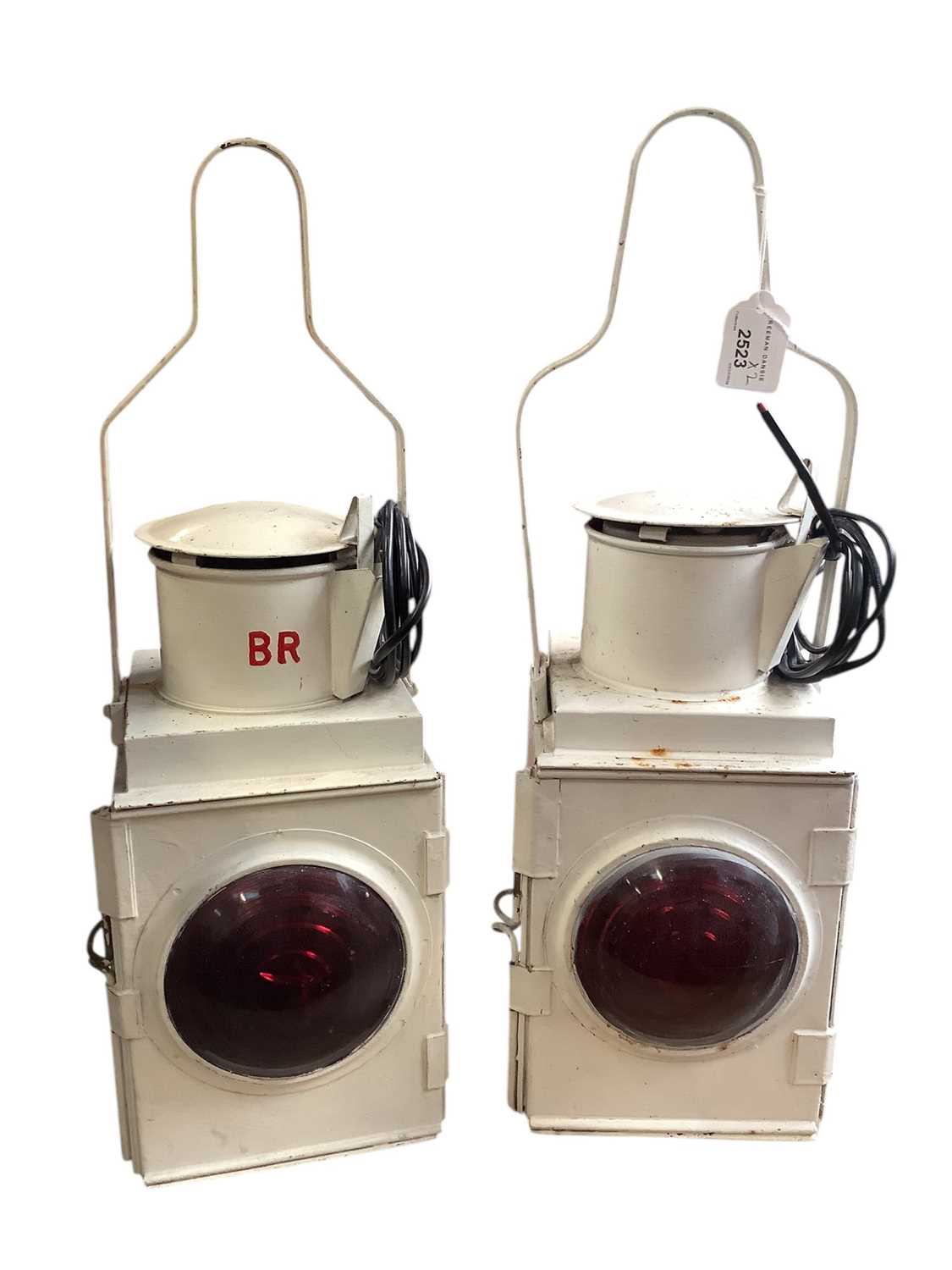 Lot 2523 - Pair of white painted railway lamps, one with 'BR' for British Rail, 63cm high including handles
