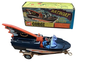 Lot 1754 - Corgi diecast 1966 First Issue Batmobile No.267 & 1968 First Issue Batboat & Trailer No.107, both boxed, plus autographed Batman (Adam West) & Robin (Burt Ward) framed photograph, 41...