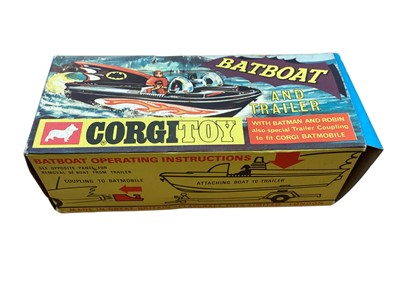 Lot 1754 - Corgi diecast 1966 First Issue Batmobile No.267 & 1968 First Issue Batboat & Trailer No.107, both boxed, plus autographed Batman (Adam West) & Robin (Burt Ward) framed photograph, 41...