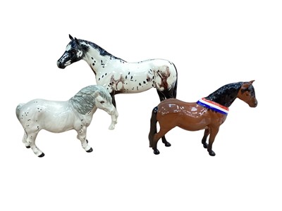 Lot 1299 - Beswick Appaloosa Stallion (chipped ear) together with two Beswick ponies (3)