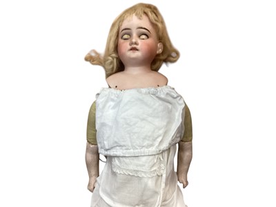 Lot 1765 - Doll bisque head and shoulders marked AM C.O.D 930 D.E.P., fabric body composite lower arms.