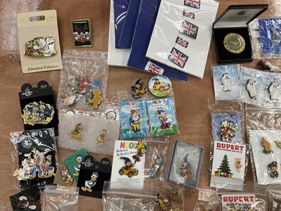 Lot 2603 - Collection of enamel bagels and pins including Blue Peter, Noddy, Flintstones, Tin Tin, Disney, Paddington, Rupert The Bear, etc