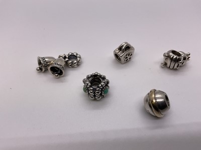 Lot 256 - Five Pandora silver charms