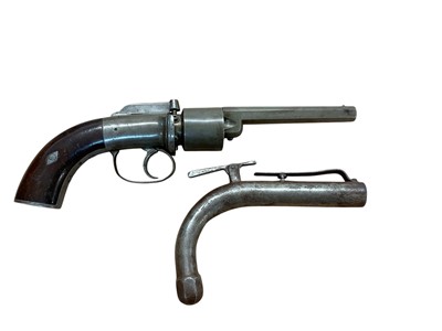 Lot 1063 - Victorian percussion transitional revolver with Birmingham proofs with walnut grips 28cm overall and crude 19th century percussion pistol (2)