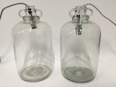 Lot 164 - Two Demijohn glass hanging ceiling lanterns, 34cm high