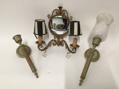 Lot 168 - Gilt metal wall sconce with central mirror and a pair of wall brackets with one storm lantern