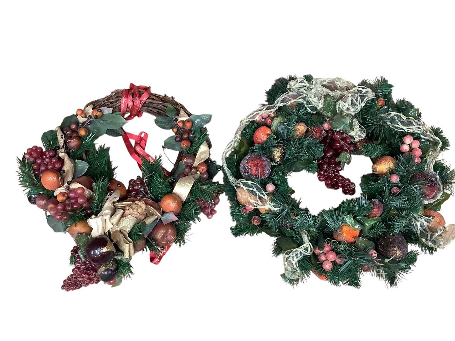 Lot 2769 - Two good quality artificial Christmas wreaths in an octagonal box.
