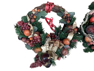 Lot 2769 - Two good quality artificial Christmas wreaths in an octagonal box.