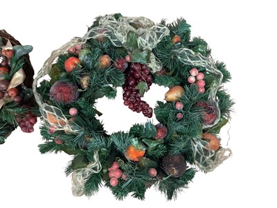 Lot 2769 - Two good quality artificial Christmas wreaths in an octagonal box.