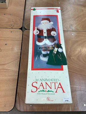 Lot 2780 - American '26'' Animated Santa', together with a free standing figure of Father Christmas (2).