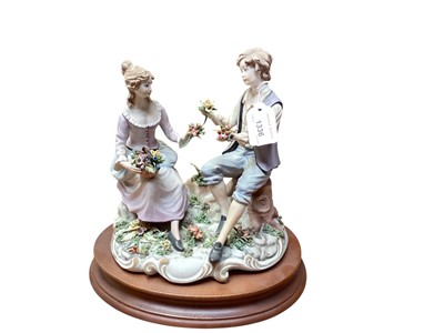 Lot 1336 - Collection of 7 Capodimonte figures including seated couple picking flowers, boy with basket of fruit, girl playing a musical instrument etc (some signed) together with two small figures and two...