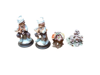 Lot 1336 - Collection of 7 Capodimonte figures including seated couple picking flowers, boy with basket of fruit, girl playing a musical instrument etc (some signed) together with two small figures and two...