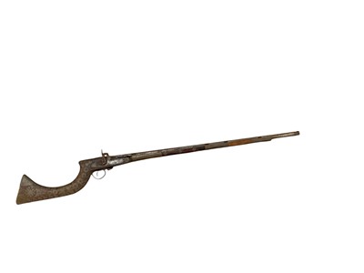 Lot 1066 - 19th century Arab jazel percussion musket with applied brass decoration to stock and barrel, 126cm overall